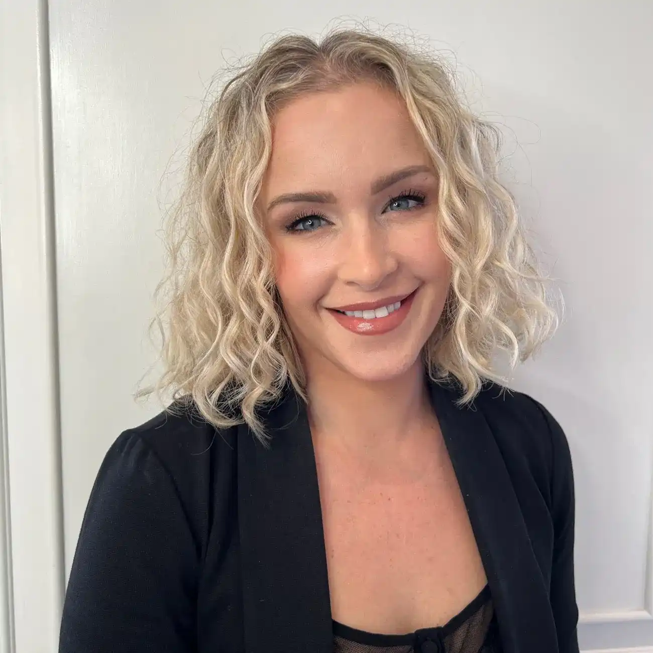 Portrait of Kelsey, a professional stylist at Panico Salon & Spa, showcasing their expertise and style.